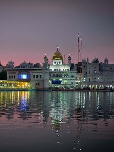 Preview wallpaper amritsar, india, punjab, city, evening, temple, harmandir sahib, water, reflection