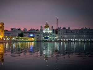 Preview wallpaper amritsar, india, punjab, city, evening, temple, harmandir sahib, water, reflection