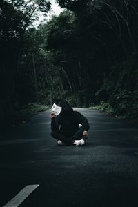 Preview wallpaper anonymous, man, mask, road, forest