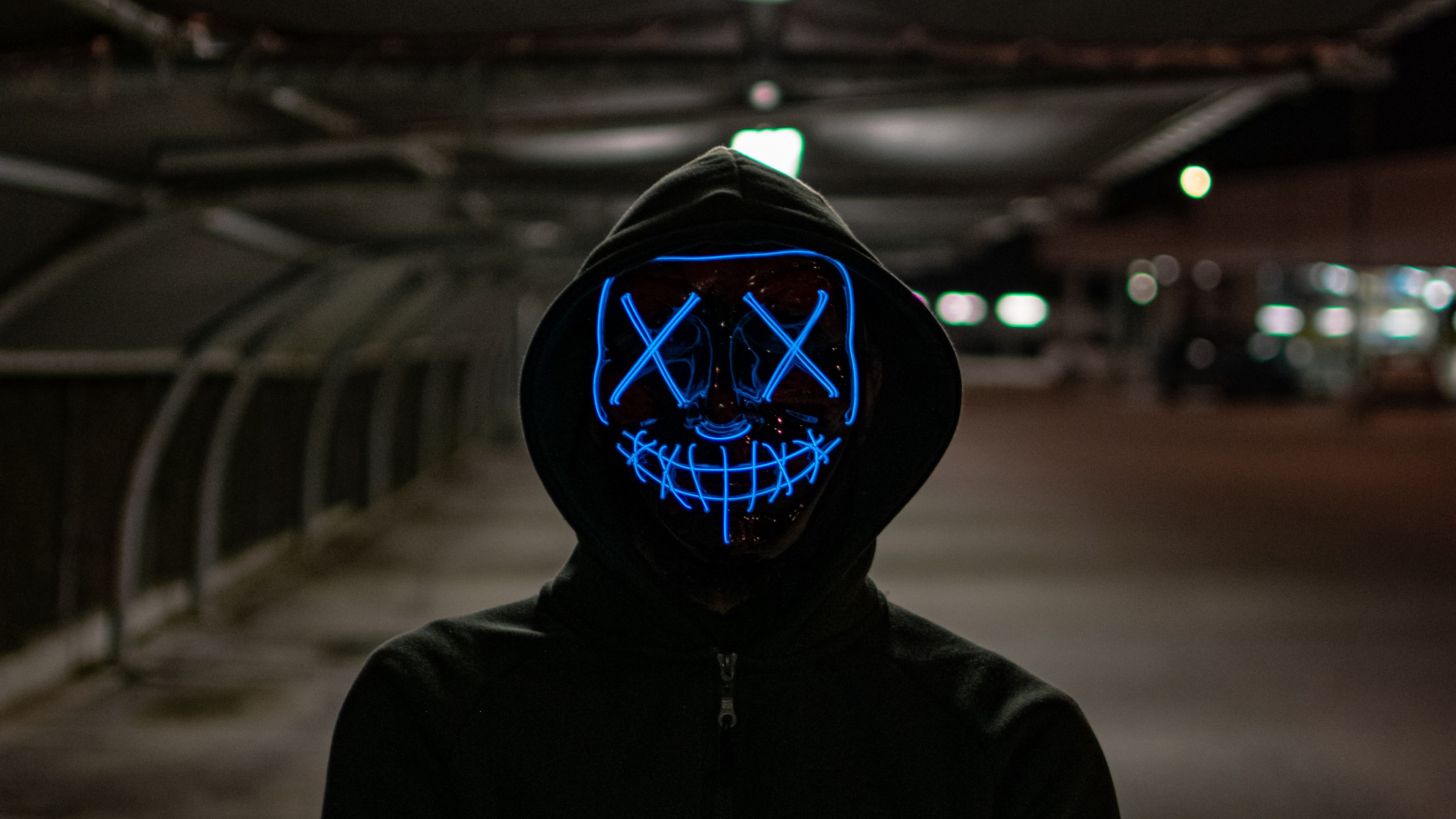 Wallpaper lights dark wallpaper blur neon situations anonymous mask  silhouette hood 4k ultra hd background city background images for  desktop section ситуации  download