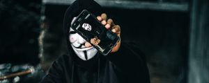 Preview wallpaper anonymous, mask, phone, person
