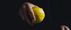 Preview wallpaper apple, hand, fruit, dark background