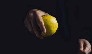 Preview wallpaper apple, hand, fruit, dark background