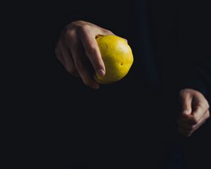 Preview wallpaper apple, hand, fruit, dark background