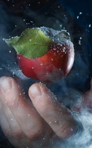 Preview wallpaper apple, hand, snow, steam