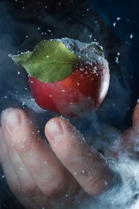 Preview wallpaper apple, hand, snow, steam