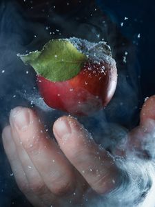 Preview wallpaper apple, hand, snow, steam