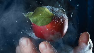 Preview wallpaper apple, hand, snow, steam
