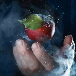 Preview wallpaper apple, hand, snow, steam