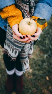 Preview wallpaper apple, hands, autumn, harvest