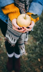 Preview wallpaper apple, hands, autumn, harvest