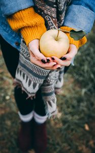 Preview wallpaper apple, hands, autumn, harvest