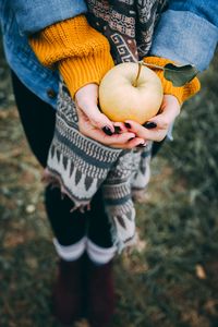 Preview wallpaper apple, hands, autumn, harvest