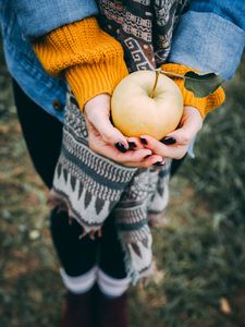 Preview wallpaper apple, hands, autumn, harvest