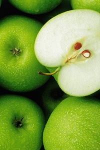 Preview wallpaper apples, green, fruit, drops, half