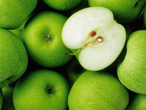 Preview wallpaper apples, green, fruit, drops, half