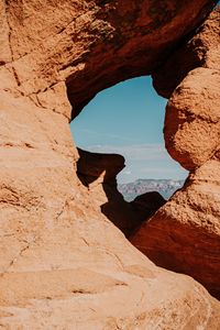 Preview wallpaper arch, cave, rocks, stones, stone, sky