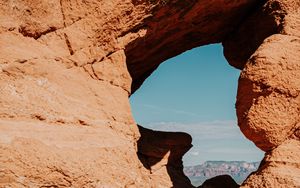 Preview wallpaper arch, cave, rocks, stones, stone, sky