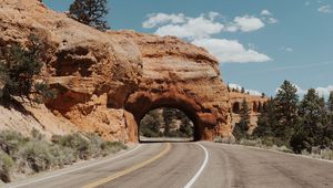 Preview wallpaper arch, road, rocks, marking