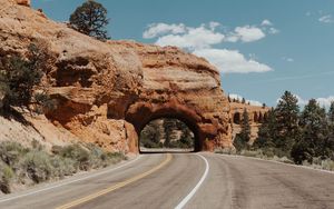 Preview wallpaper arch, road, rocks, marking