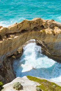 Preview wallpaper arch, rock, stone, coast, surf