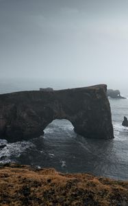 Preview wallpaper arch, rocks, cliff, sea, grass