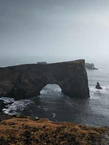 Preview wallpaper arch, rocks, cliff, sea, grass