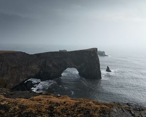 Preview wallpaper arch, rocks, cliff, sea, grass