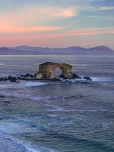 Preview wallpaper arch, rocks, sea, waves, sunset