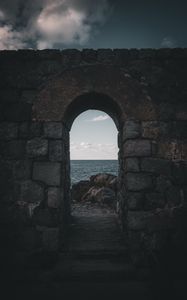 Preview wallpaper arch, stones, sea, horizon, wall