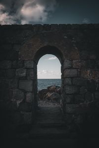 Preview wallpaper arch, stones, sea, horizon, wall