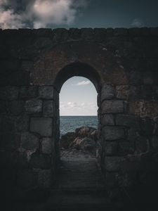 Preview wallpaper arch, stones, sea, horizon, wall