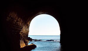 Preview wallpaper arch, water, darkness, sea