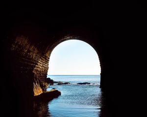 Preview wallpaper arch, water, darkness, sea