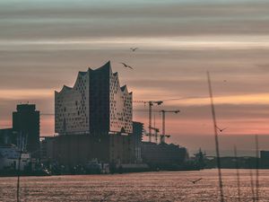 Preview wallpaper architecture, building, water, sunset