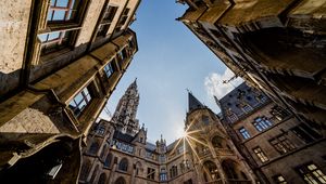 Preview wallpaper architecture, buildings, city, bottom view, rays