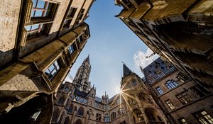 Preview wallpaper architecture, buildings, city, bottom view, rays