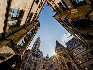 Preview wallpaper architecture, buildings, city, bottom view, rays