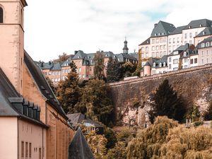 Preview wallpaper architecture, buildings, river, bushes, branches