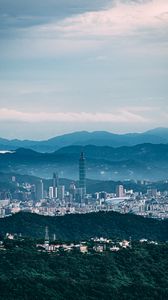 Preview wallpaper architecture, tower, skyscraper, mountains, fog