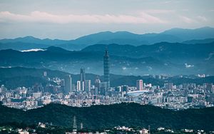 Preview wallpaper architecture, tower, skyscraper, mountains, fog