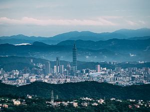 Preview wallpaper architecture, tower, skyscraper, mountains, fog