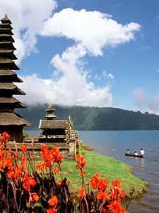Preview wallpaper asia, island, structure, flowers, mountains, boat, people