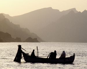 Preview wallpaper asia, mountains, fog, water, lake, boat, people