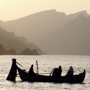 Preview wallpaper asia, mountains, fog, water, lake, boat, people