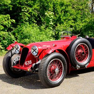 Preview wallpaper aston martin, 1939, red, side view, style, cars, retro, nature, trees, asphalt