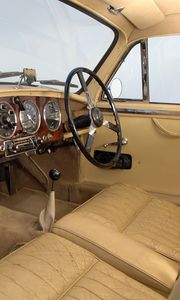 Preview wallpaper aston martin, 1950, beige, salon, retro, interior, steering wheel, speedometer