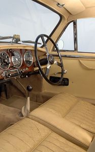 Preview wallpaper aston martin, 1950, beige, salon, retro, interior, steering wheel, speedometer