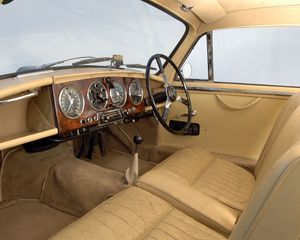 Preview wallpaper aston martin, 1950, beige, salon, retro, interior, steering wheel, speedometer