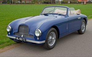 Preview wallpaper aston martin, 1951, blue, side view, style, cars, nature, grass, houses, trees